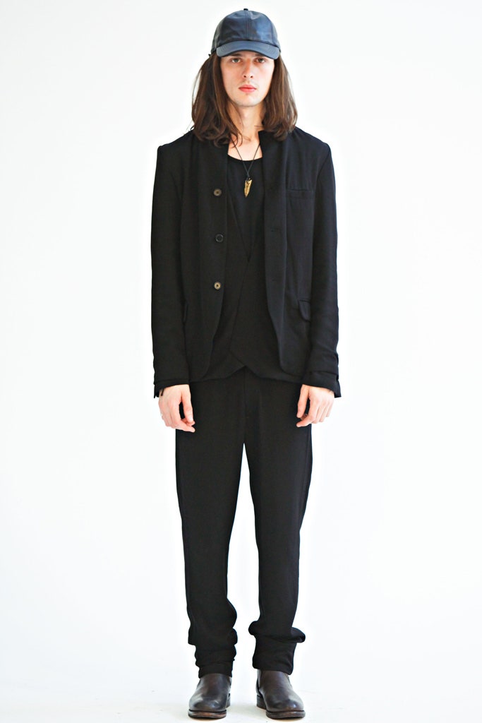 black tailored blazer with relaxed pants