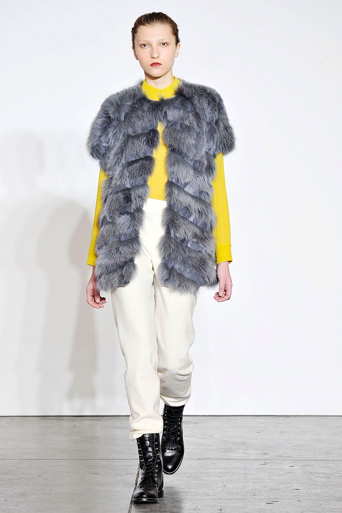 gray faux-fur vest with yellow top