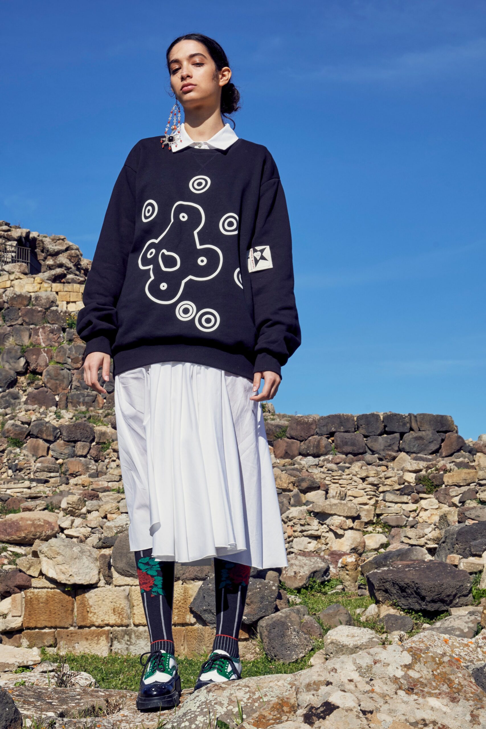 black cotton sweater with printed skirt