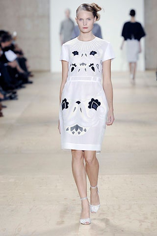 white fitted embroidered dress