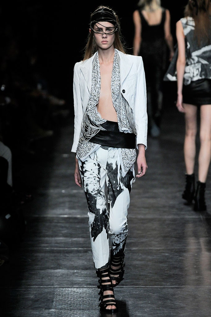 white fitted blazer with printed pants