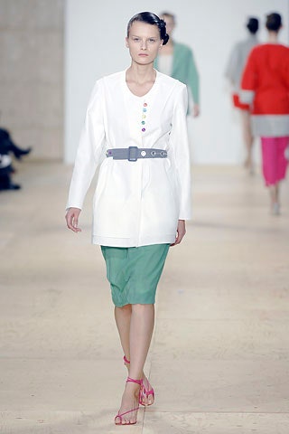 white fitted blazer with green pencil skirt