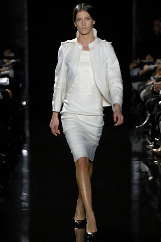 white structured jacket and fitted dress
