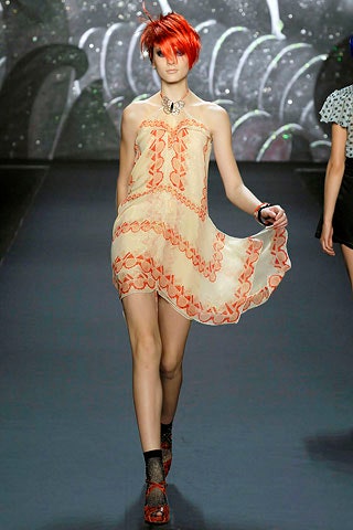 beige embroidered sleeveless dress