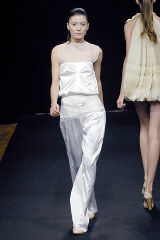 white silk sleeveless high-neck fitted draped top