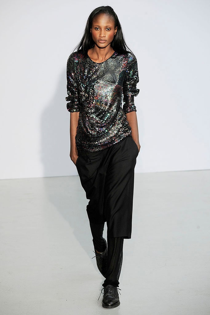 black sequin top and relaxed pants