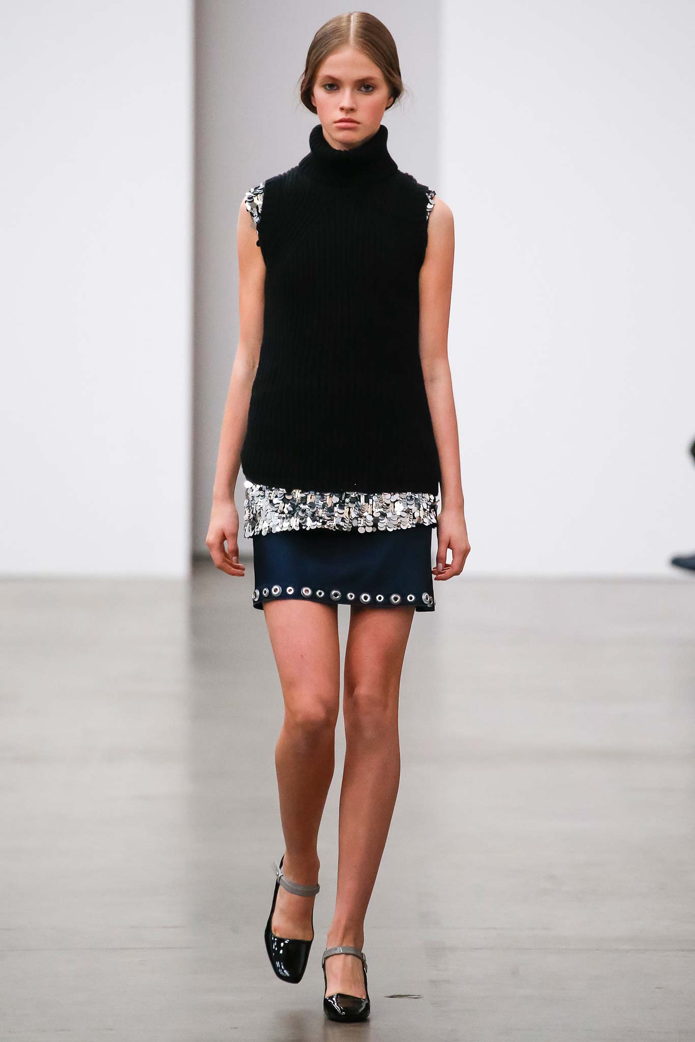 black fitted knit top and blue pencil skirt