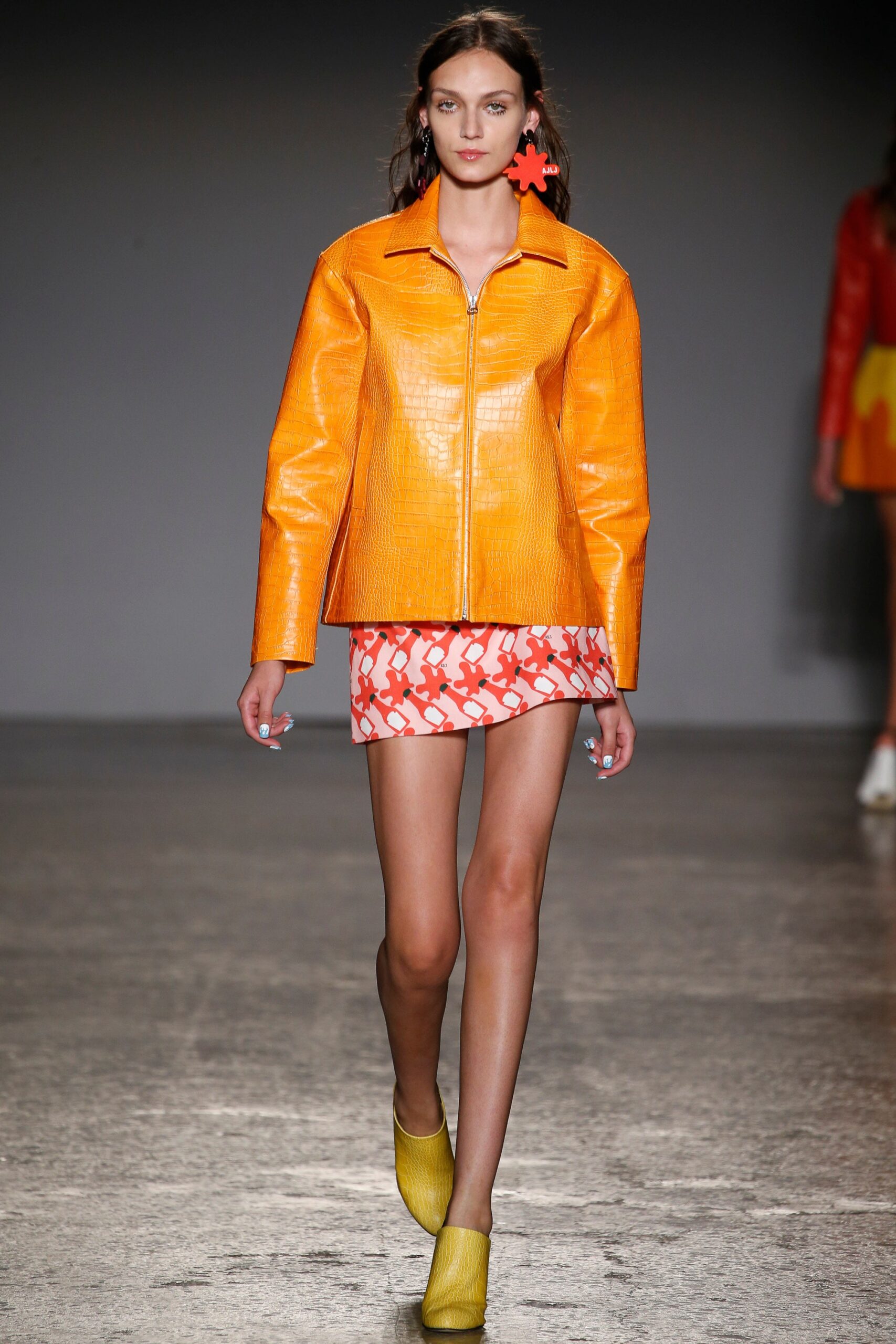 orange vinyl long-sleeve collared fitted zippered jacket