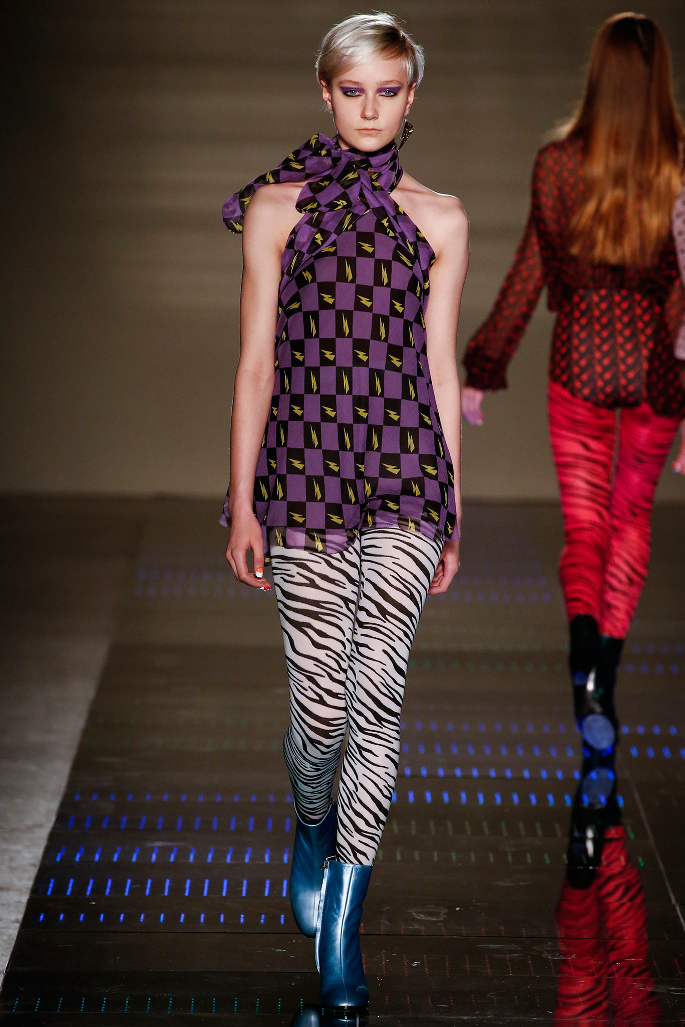 fitted purple printed top with animal-print pants