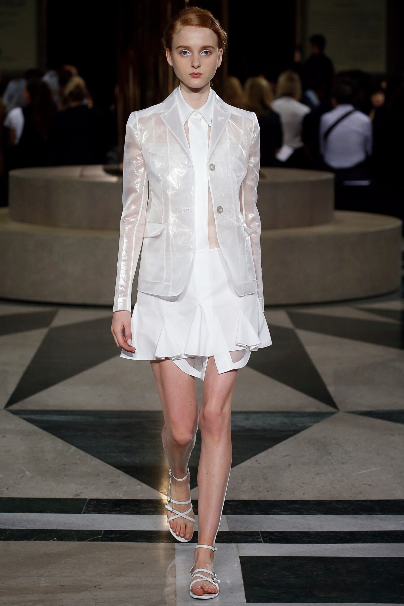 white tailored blazer with pleated skirt