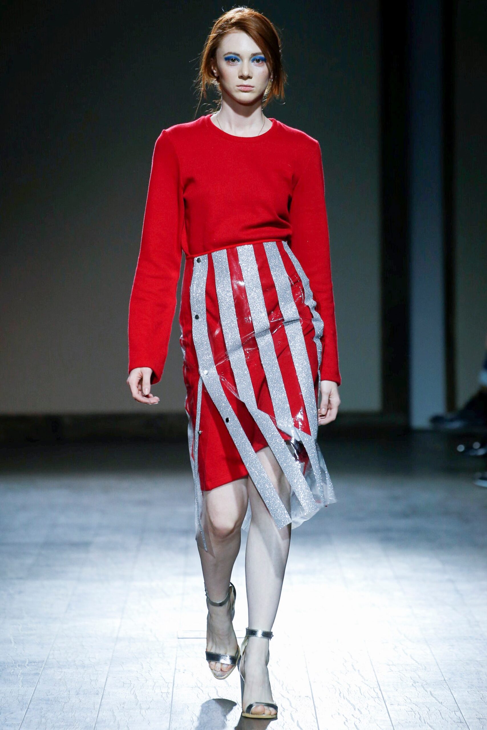 red fitted top with silver striped skirt