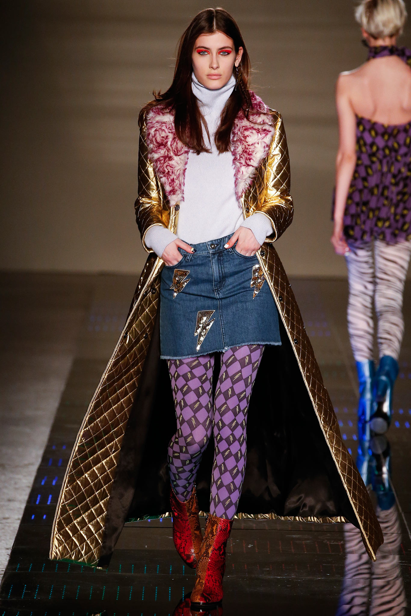 gold quilted coat with denim skirt