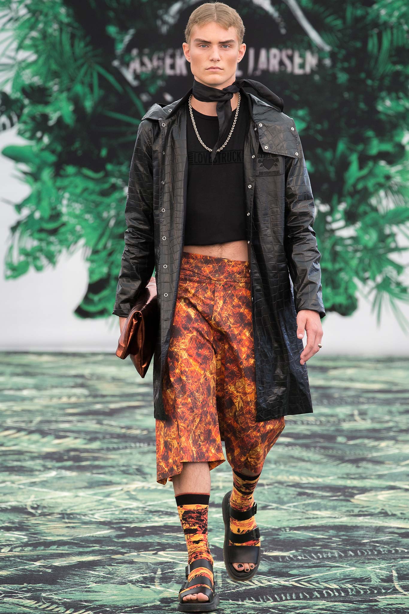 black vinyl coat with relaxed fit