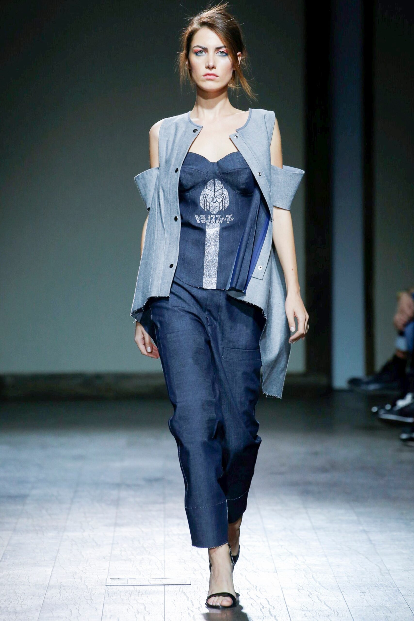 gray jacket black corset blue pants