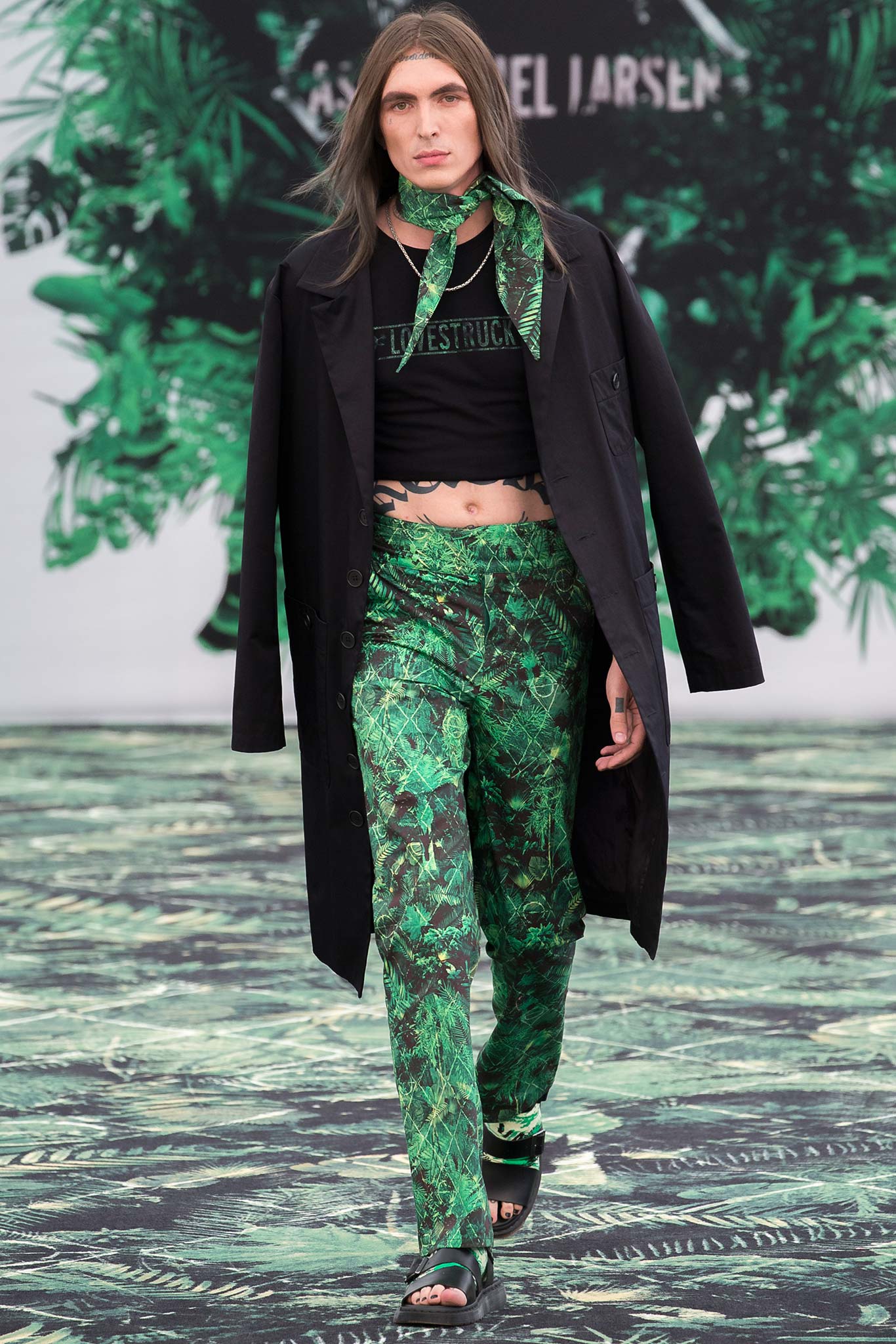 black coat and green printed pants