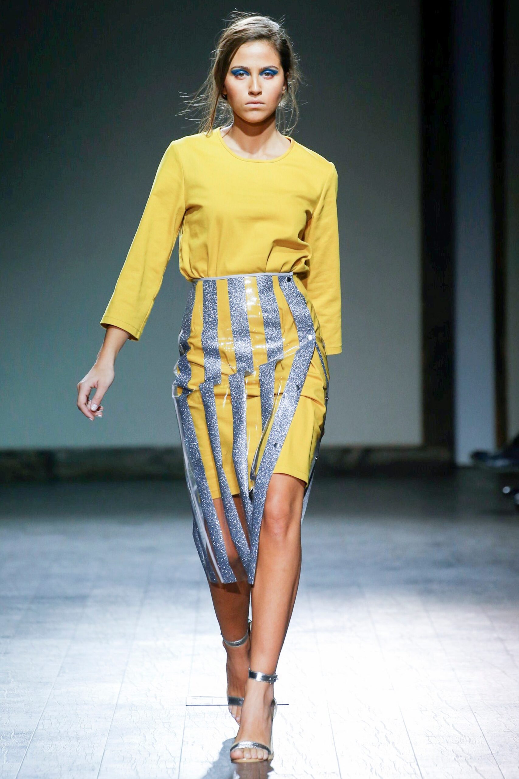 yellow fitted top with gray striped skirt