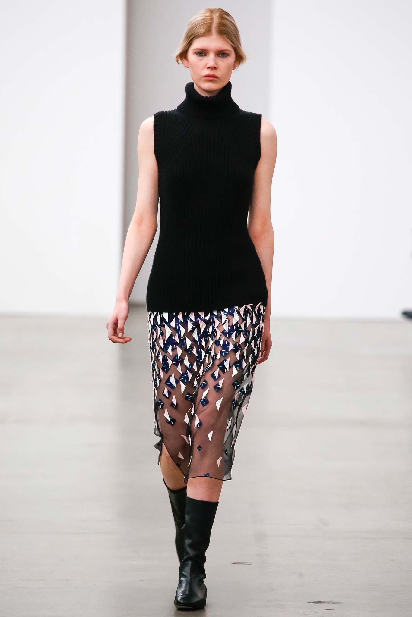 black knit sleeveless top with layered skirt