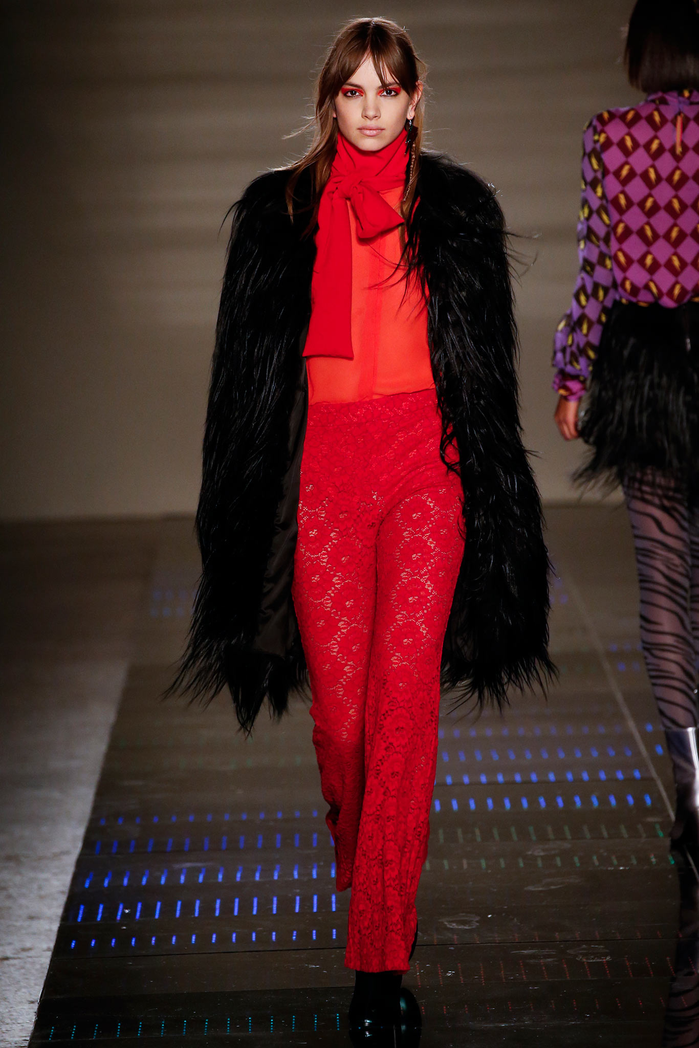 red lace pants with orange top