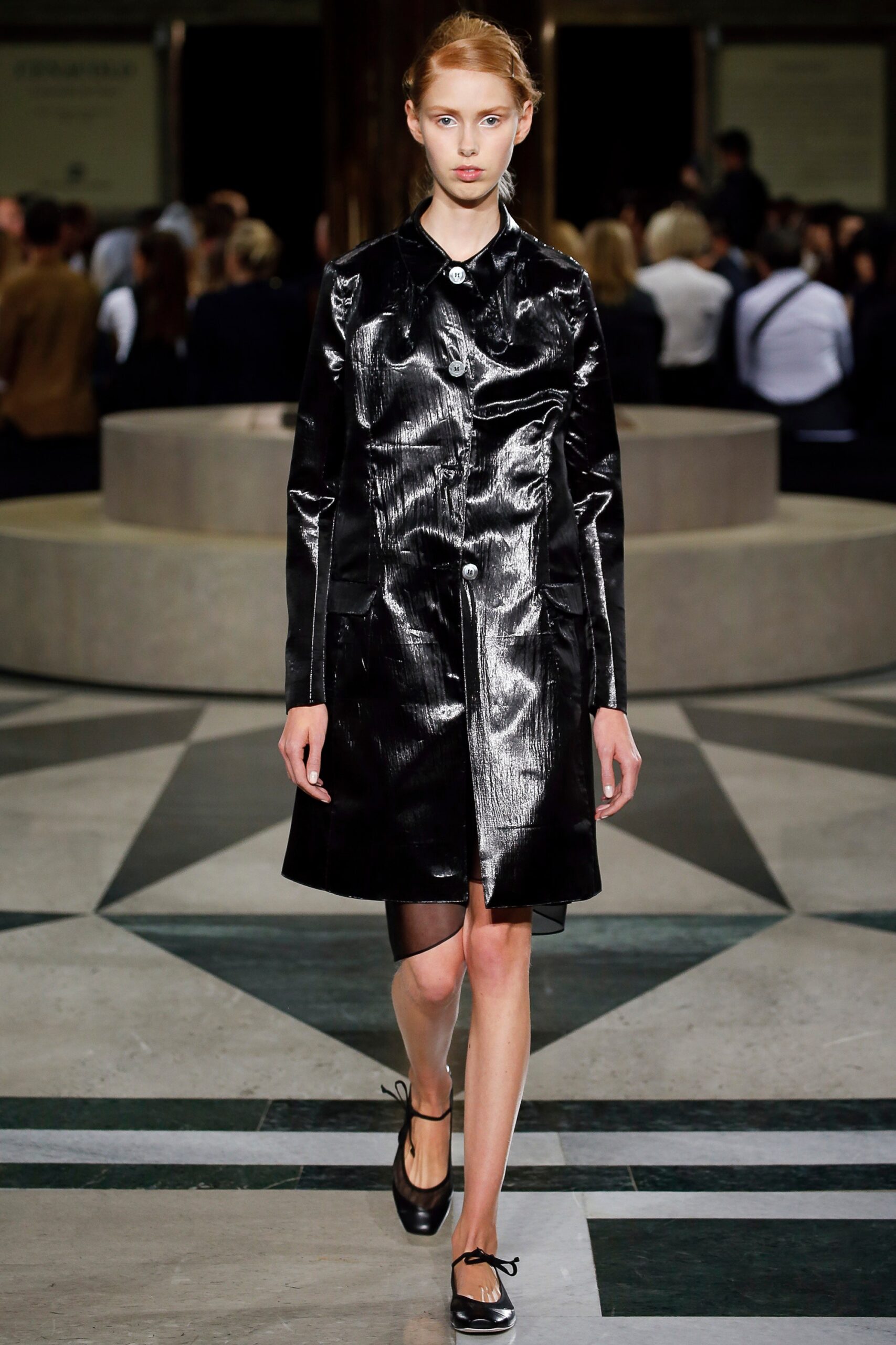 black vinyl fitted coat