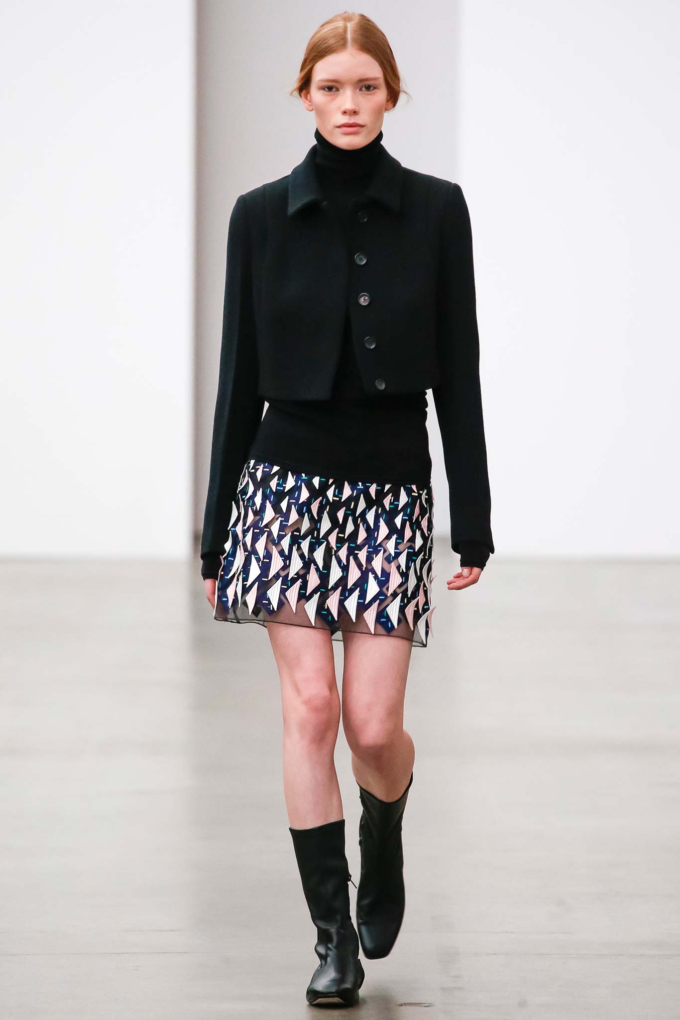 black fitted jacket with mini skirt