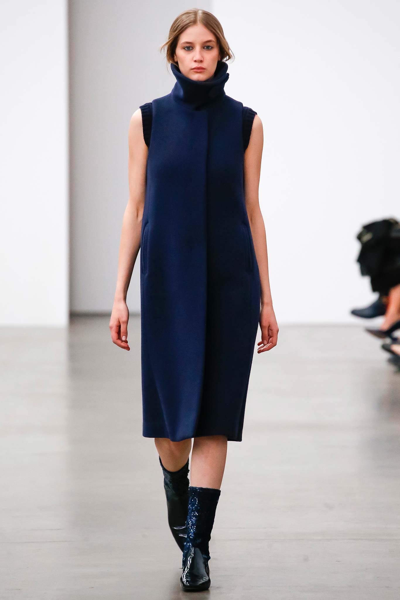 blue wool midi dress with black boots