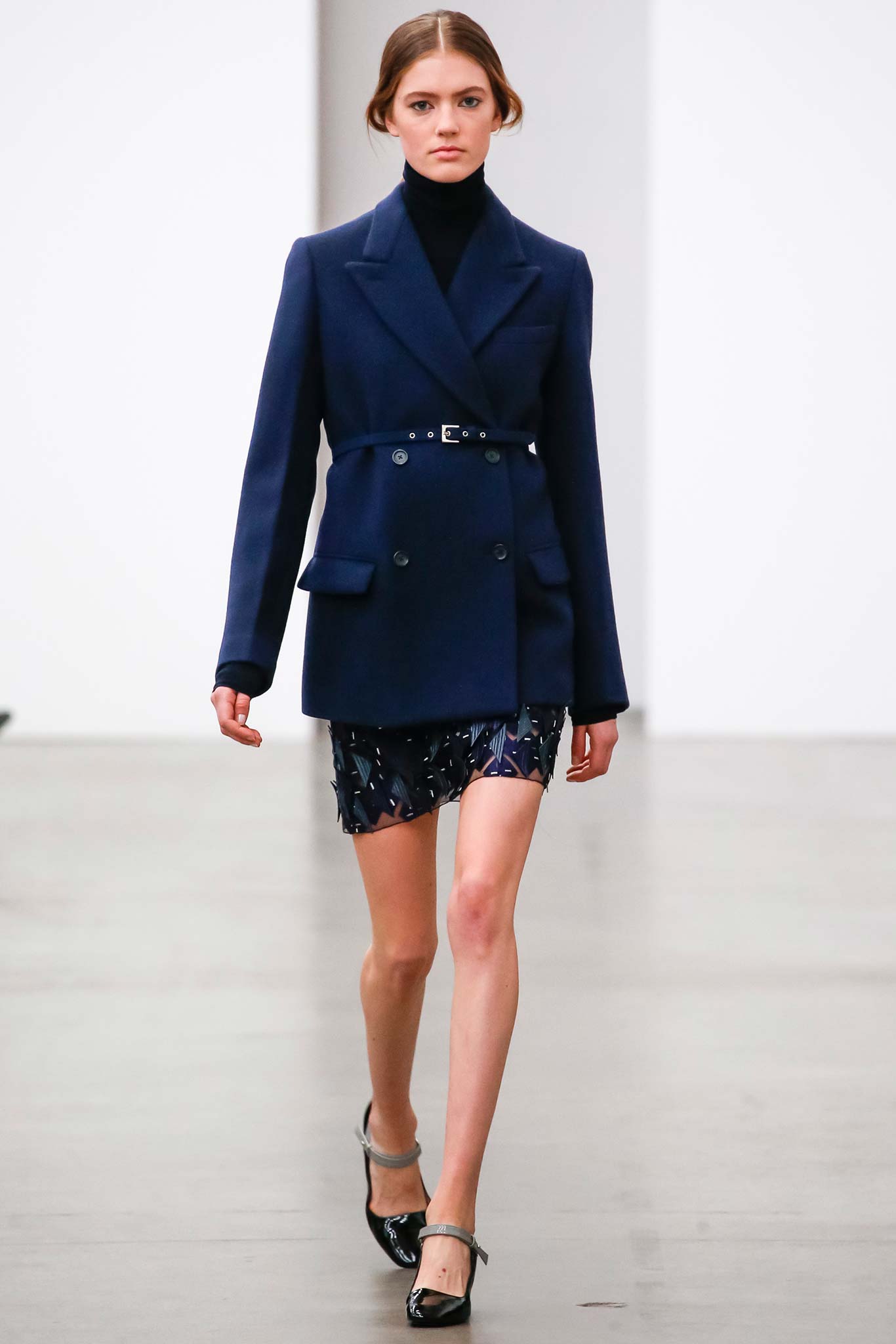 blue tailored blazer and pleated mini skirt