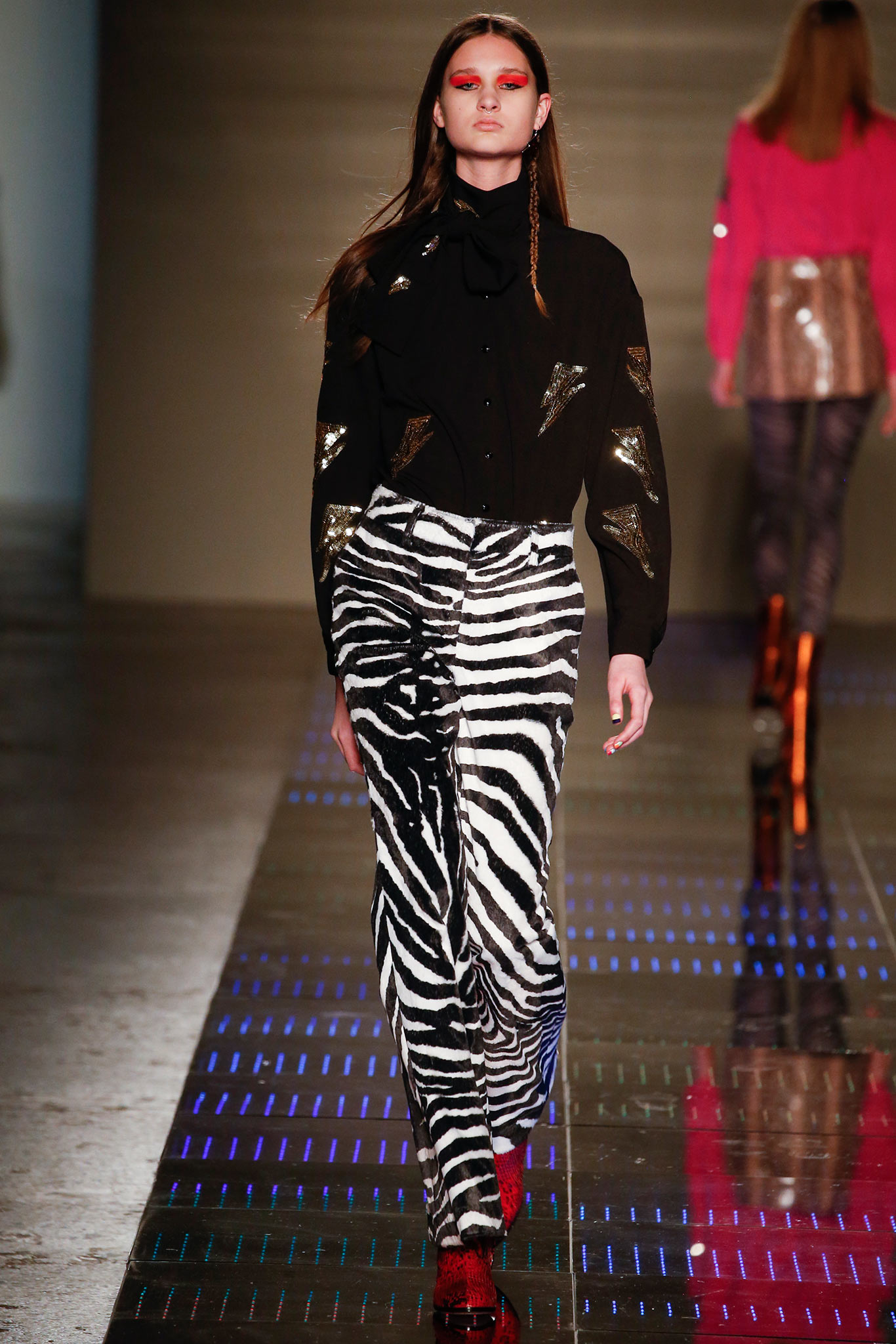 black shirt with zebra print pants