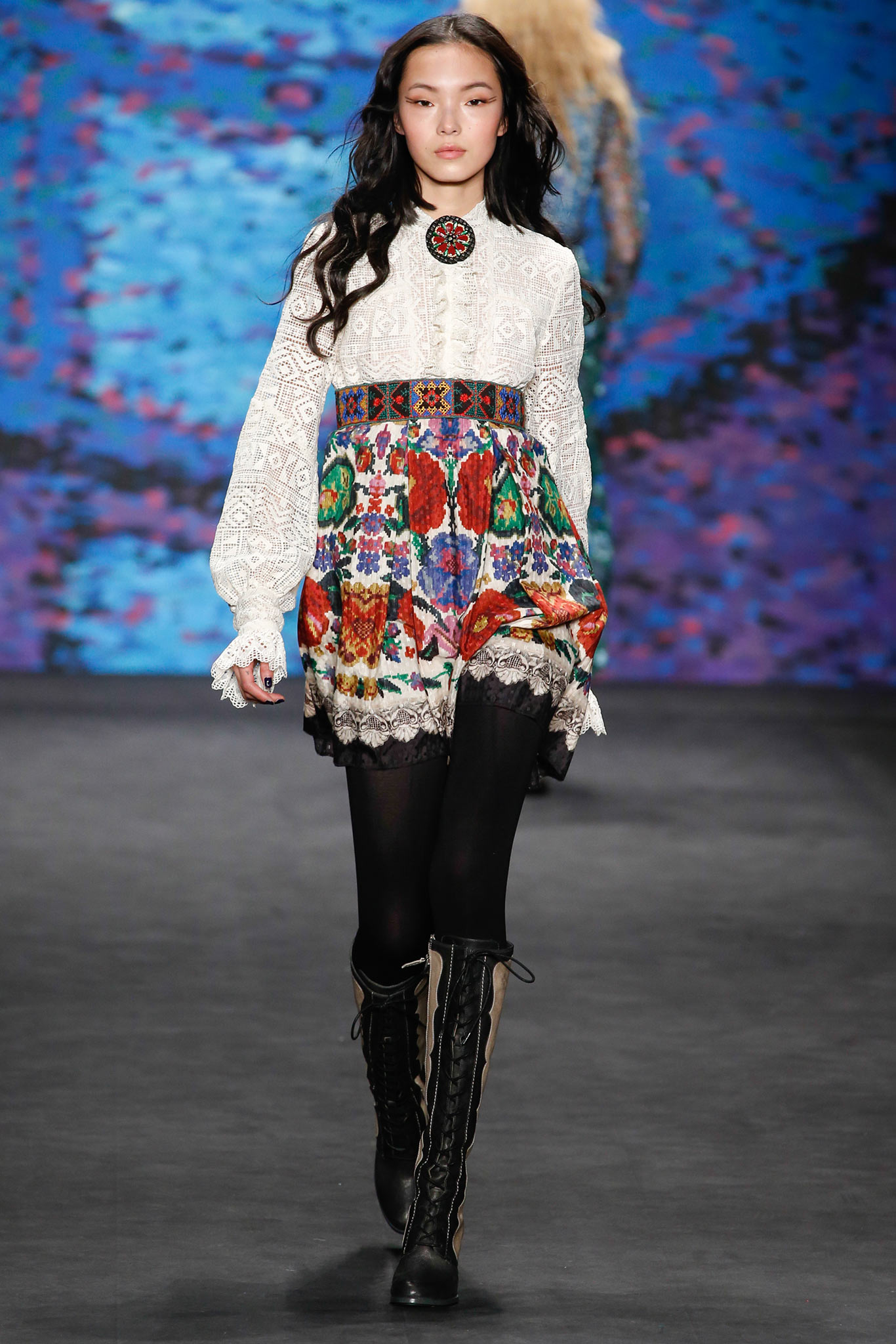 white lace blouse with multi-tiered skirt