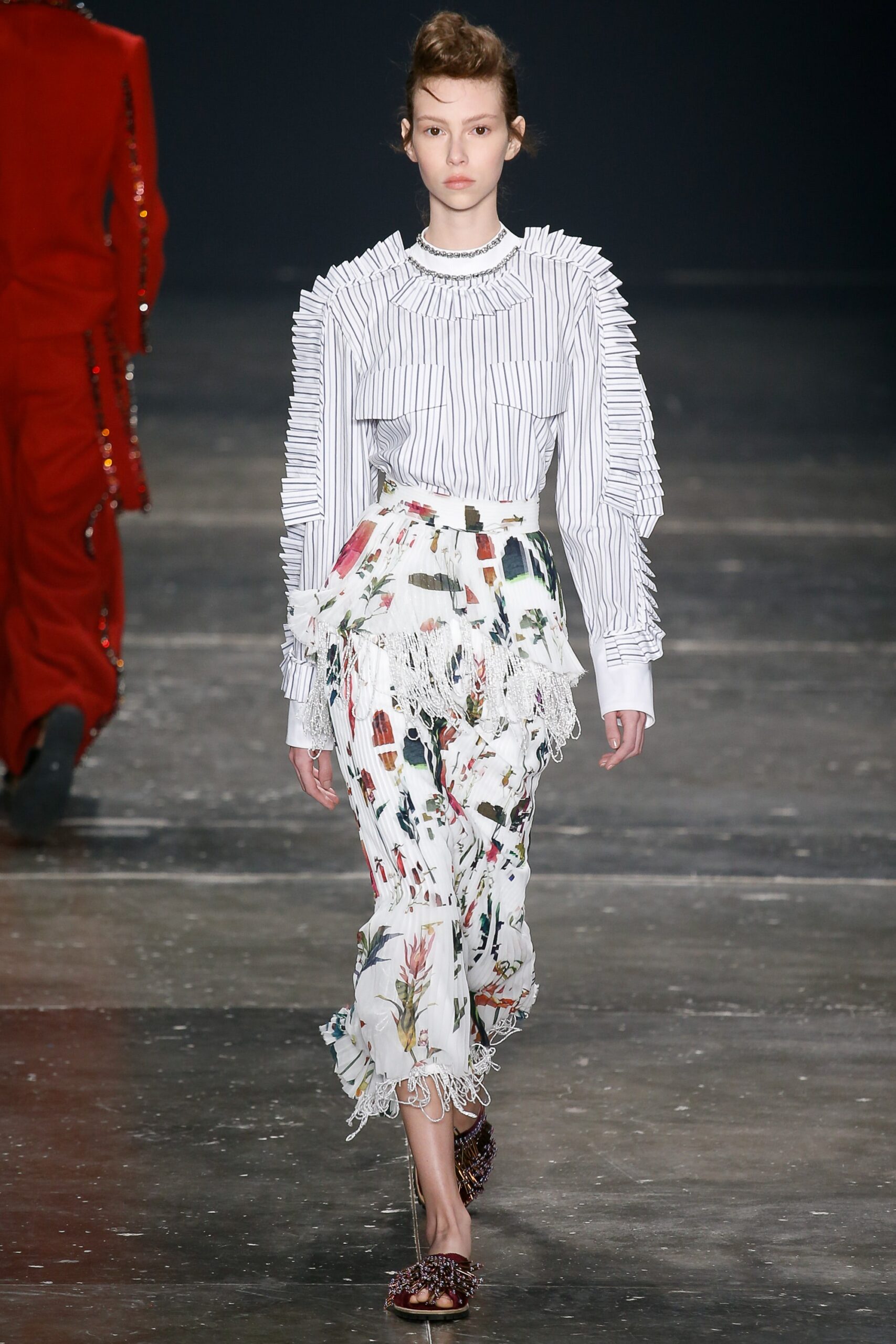 fitted white blouse and flared skirt