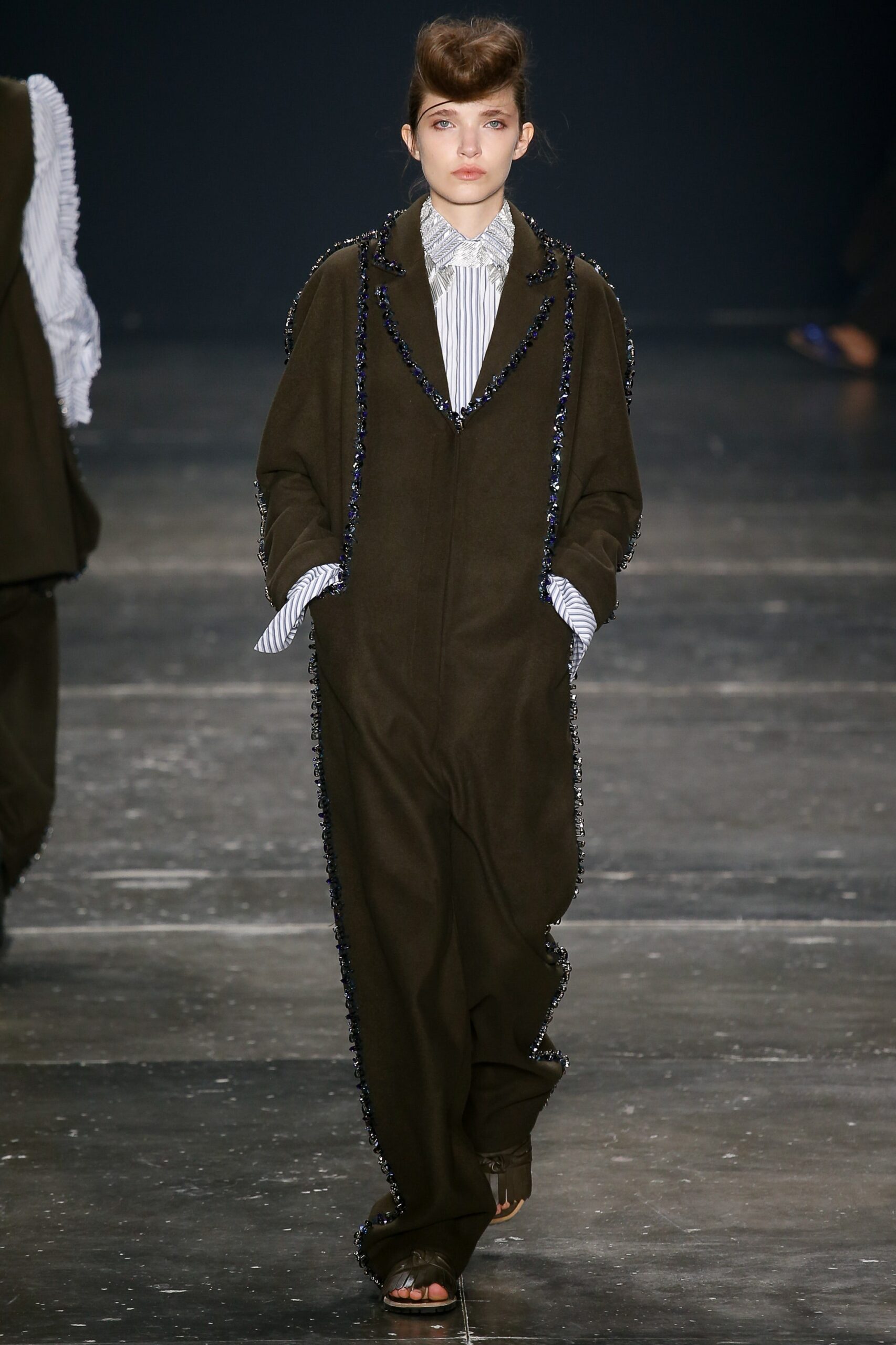 green relaxed jumpsuit with striped shirt