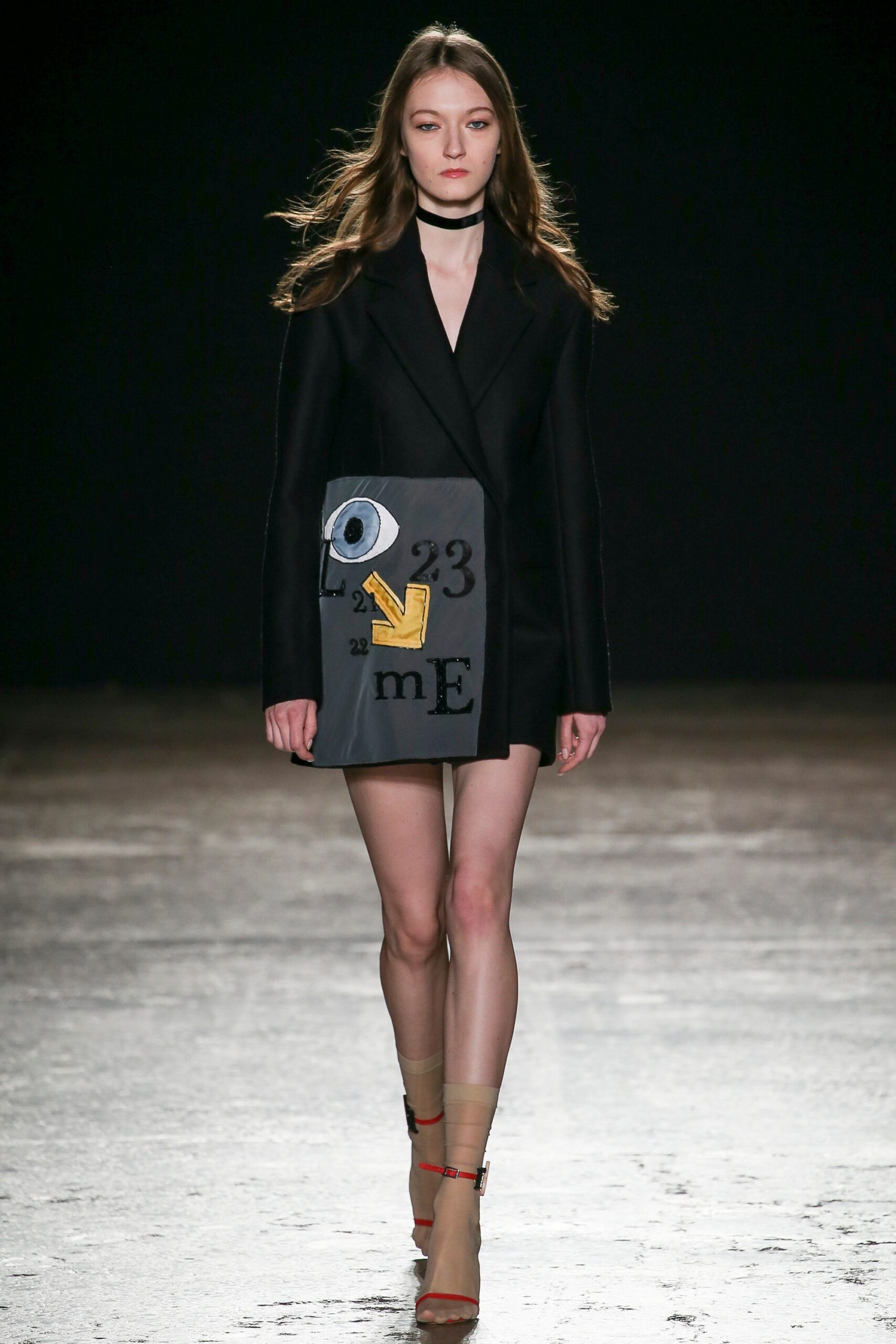 black fitted blazer and mini skirt