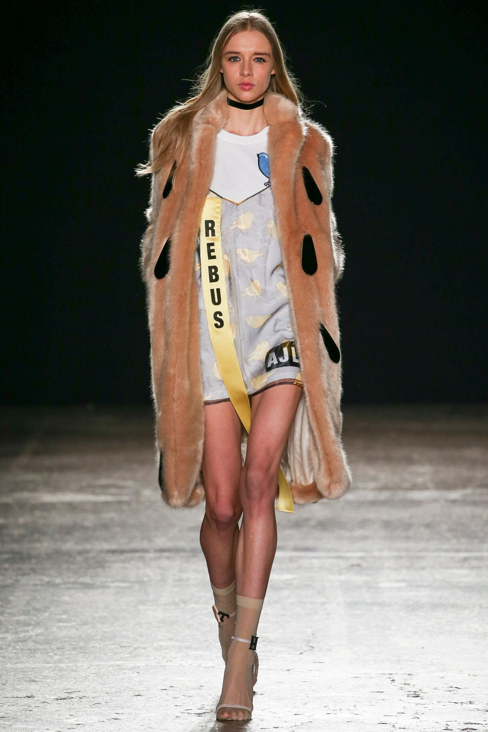 beige faux-fur coat and blue dress