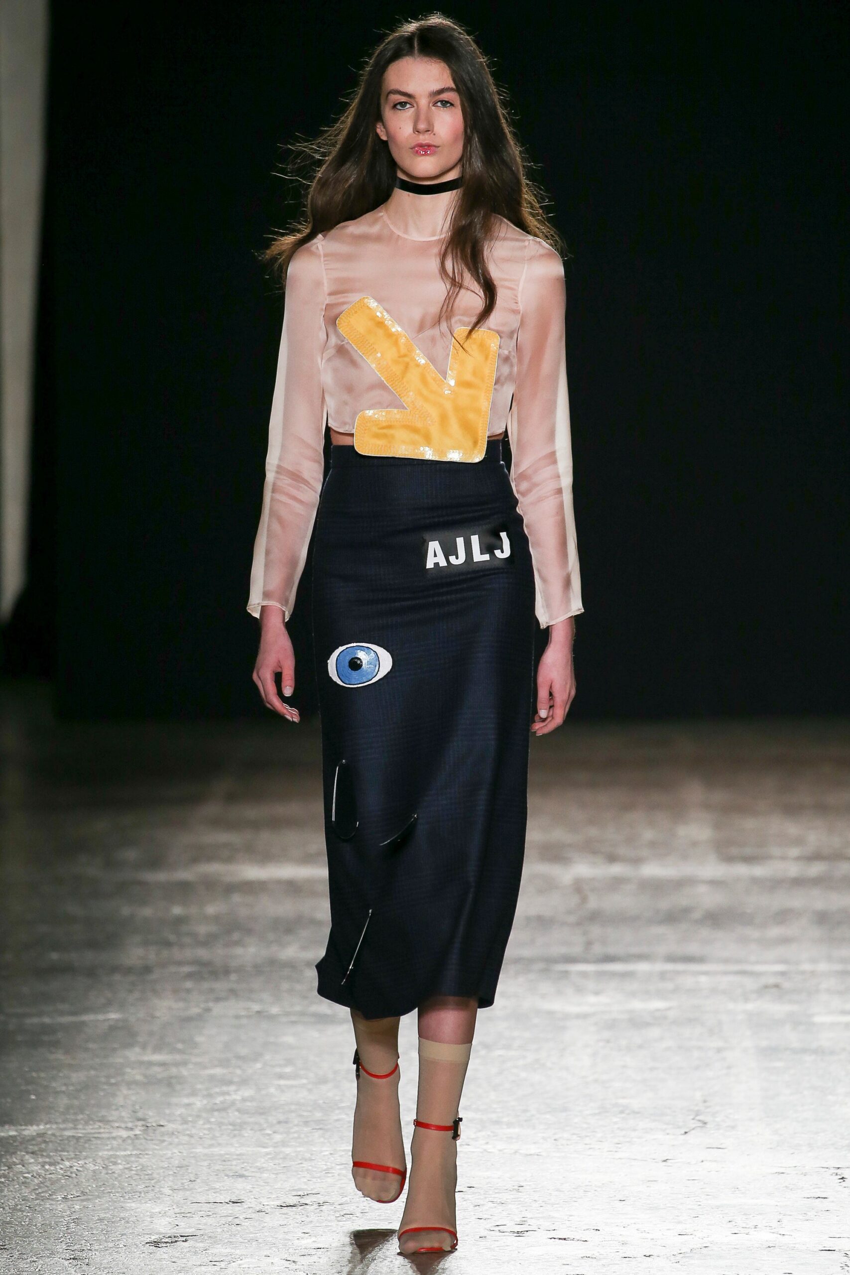 sheer beige top with blue pencil skirt