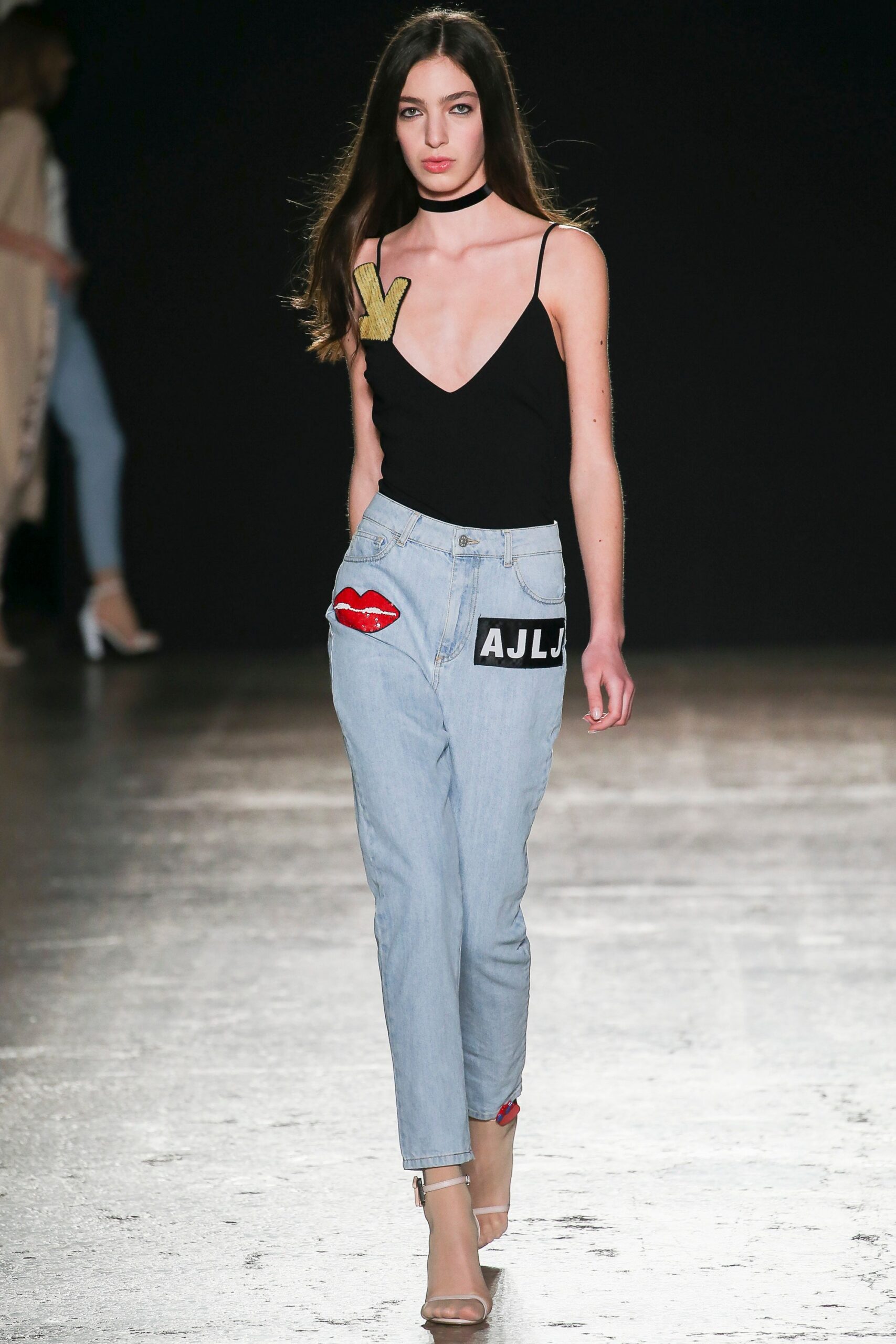 black fitted top with blue jeans
