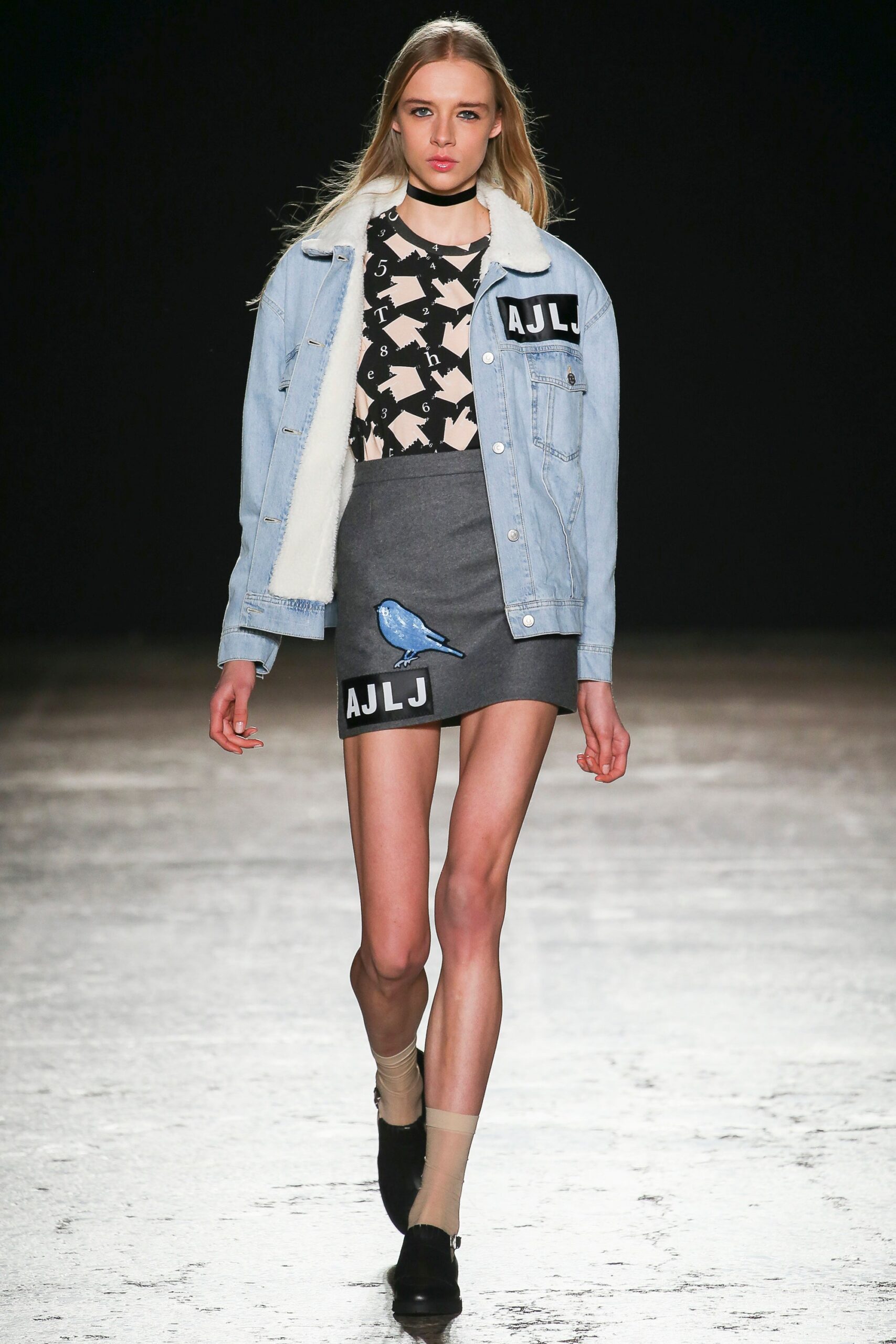 blue denim jacket with printed top and gray pencil skirt