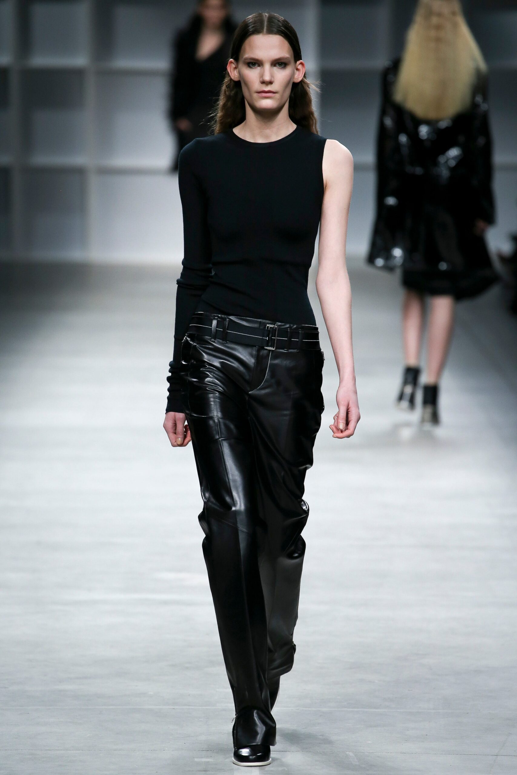 black fitted top and leather pants