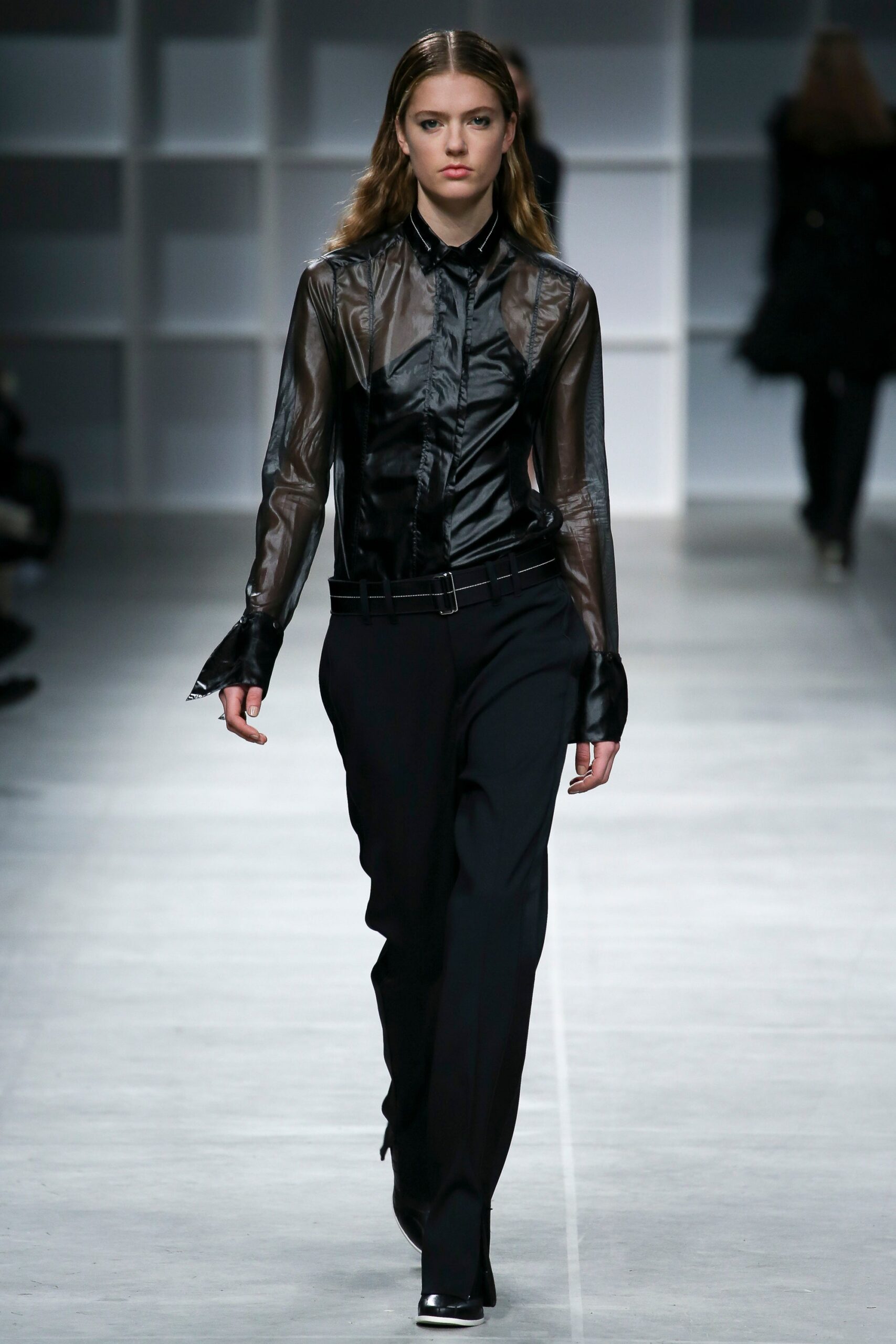 black fitted shirt and tailored pants