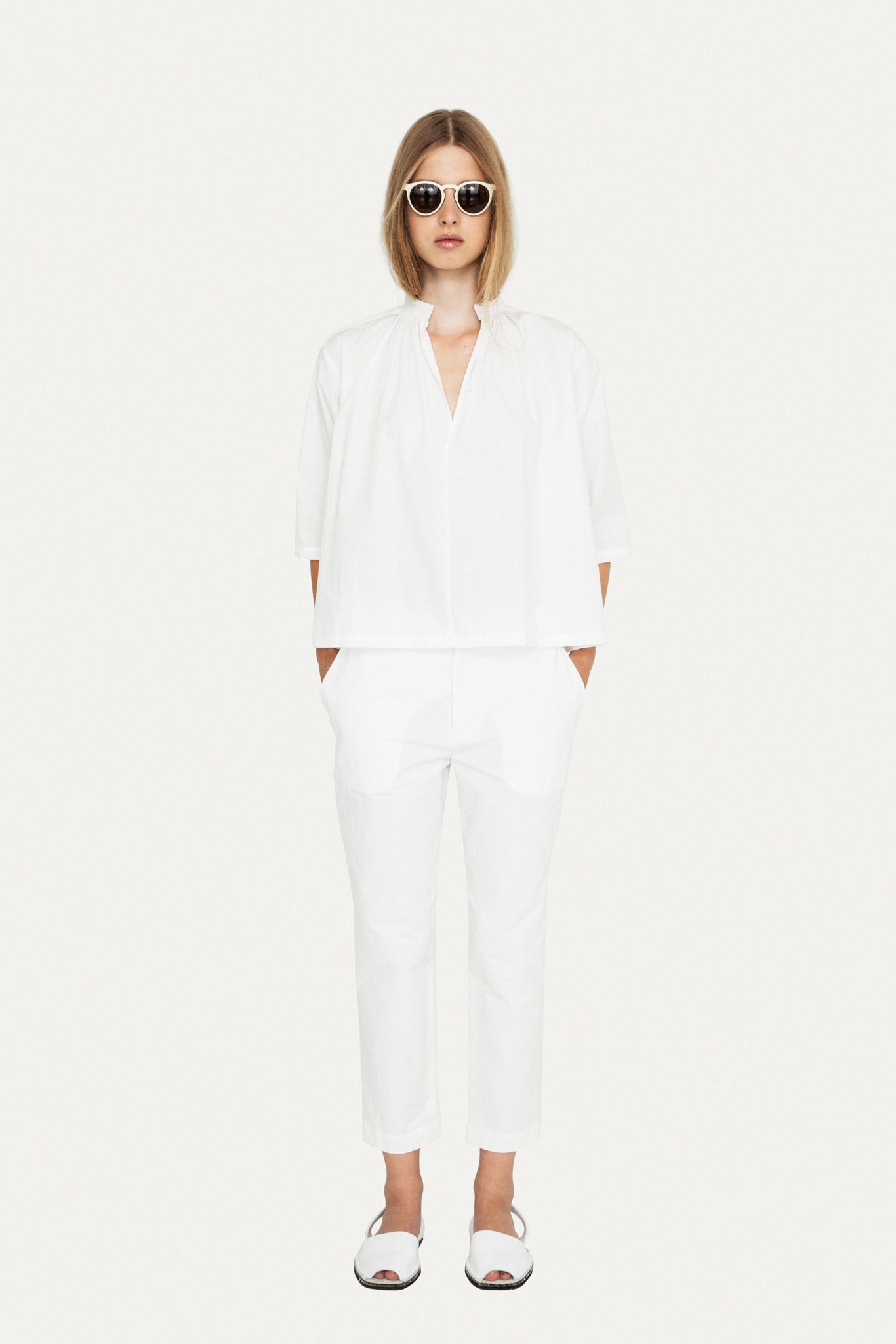 white relaxed top and tailored pants