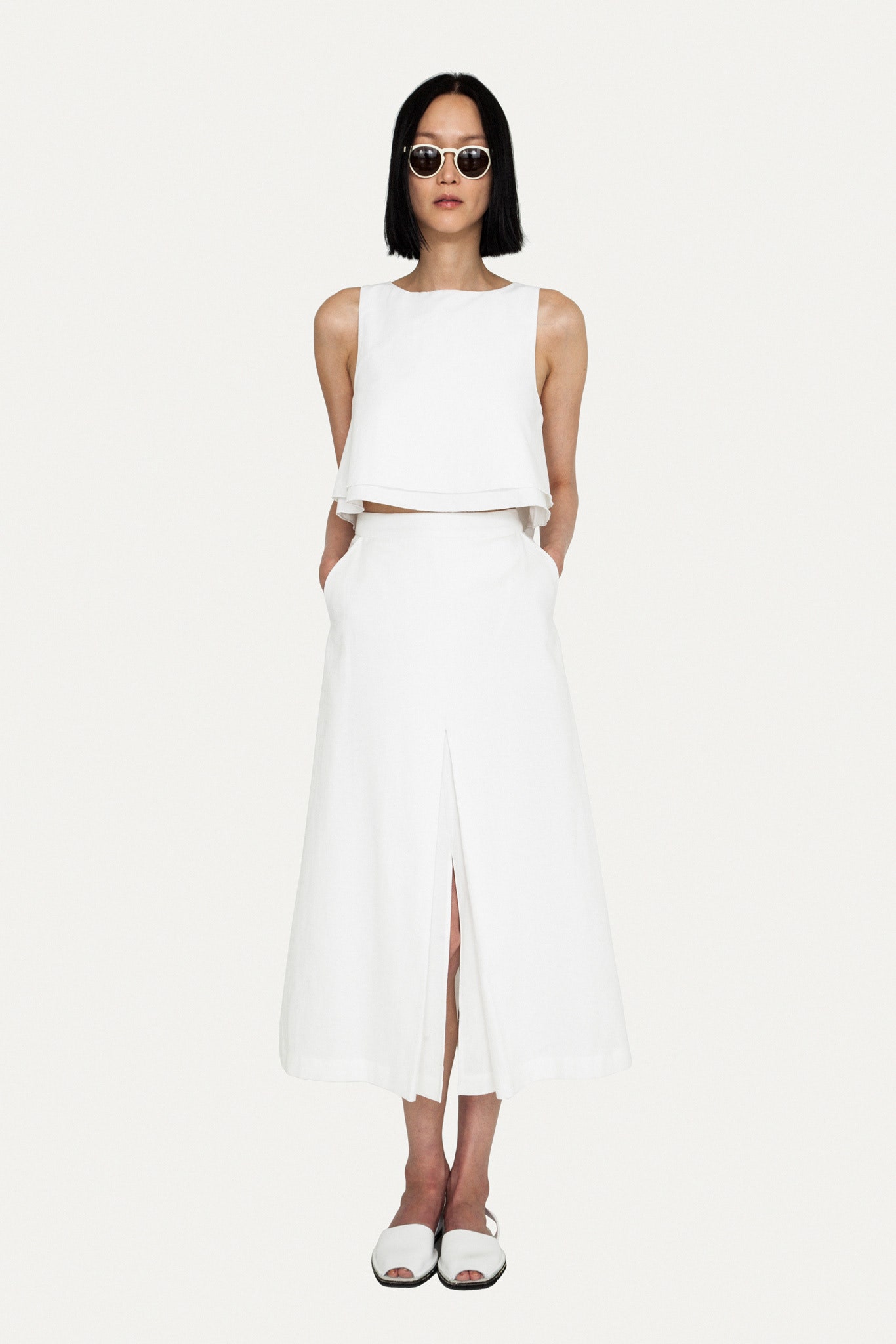white cropped top and midi skirt