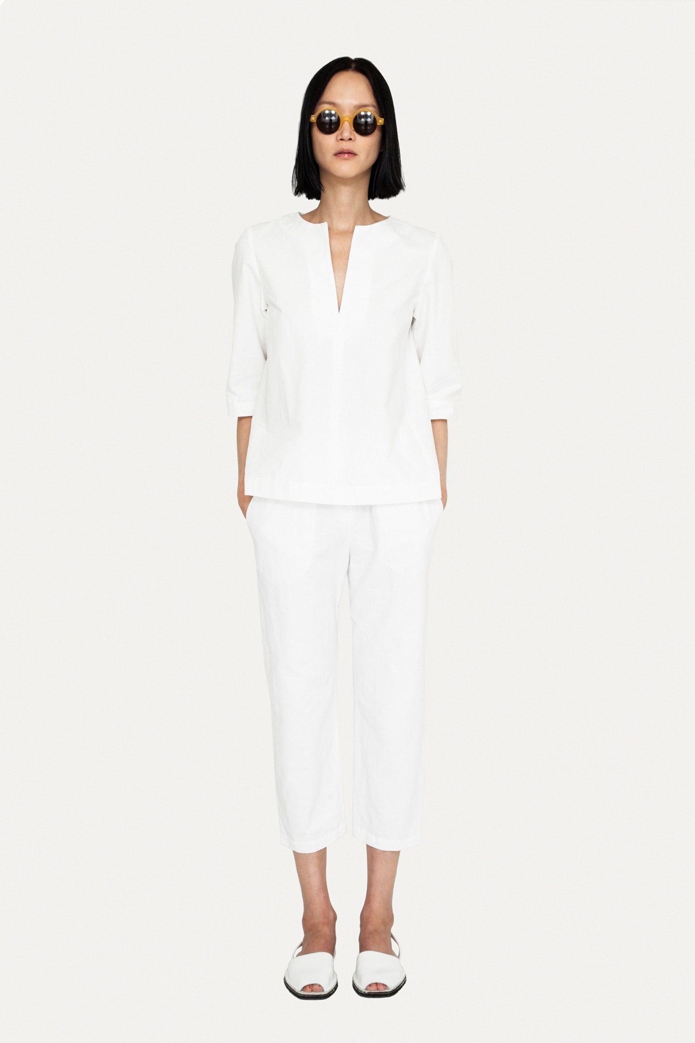 white relaxed top and pants
