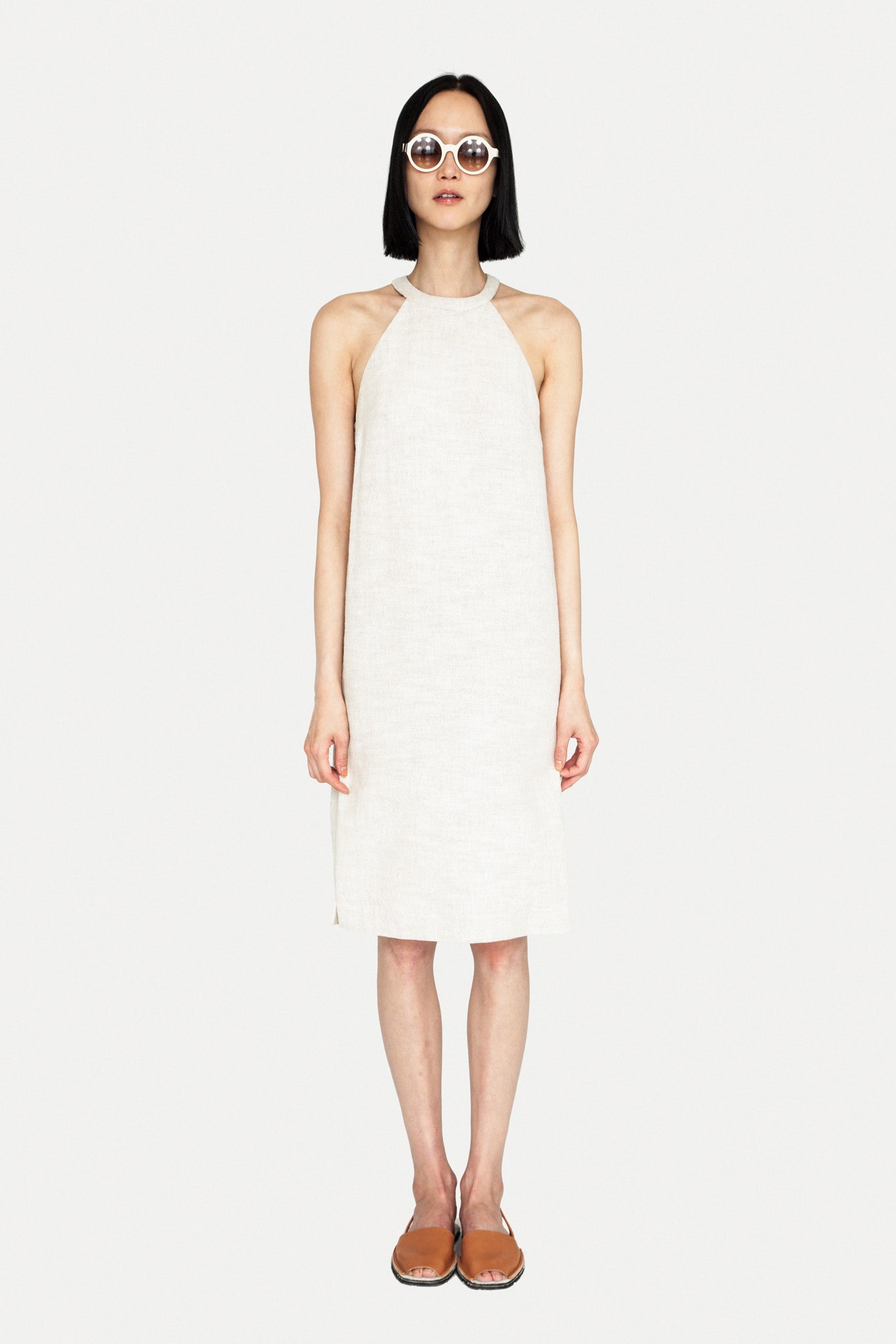 white linen sleeveless dress