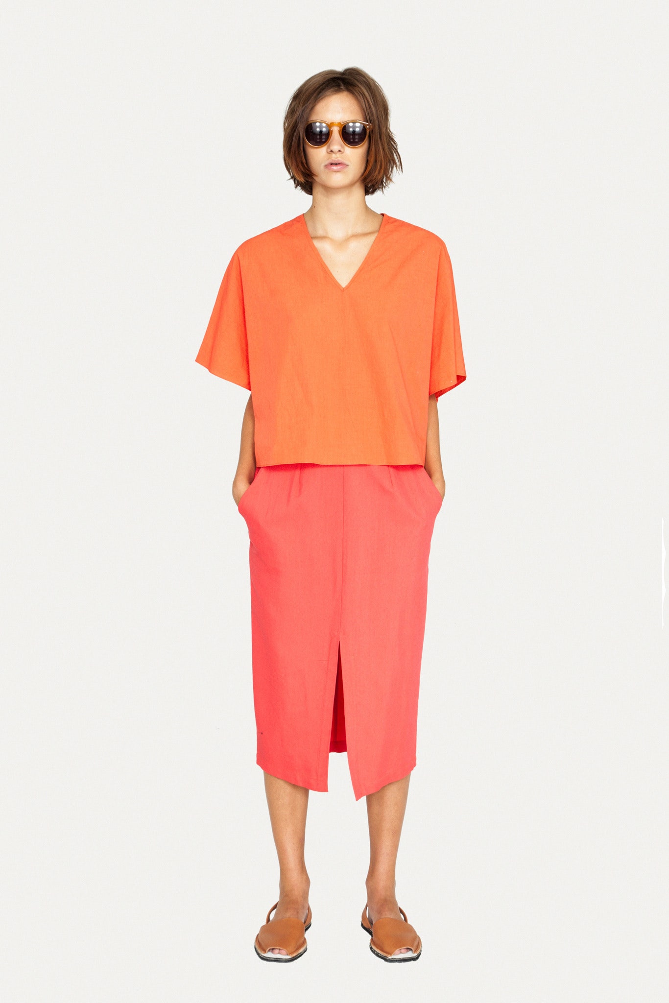 pink cotton slit fitted midi skirt