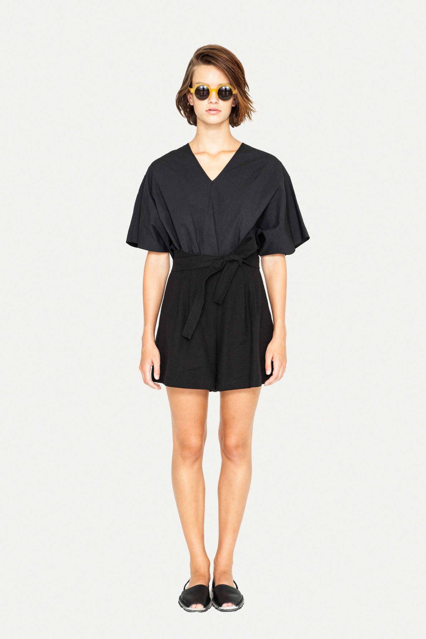 black fitted short-sleeve romper