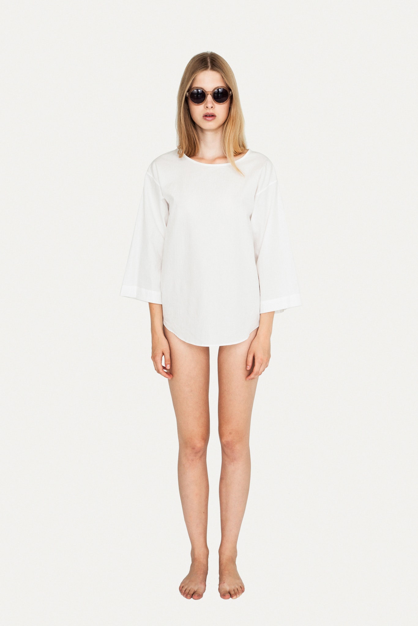white relaxed top with shorts