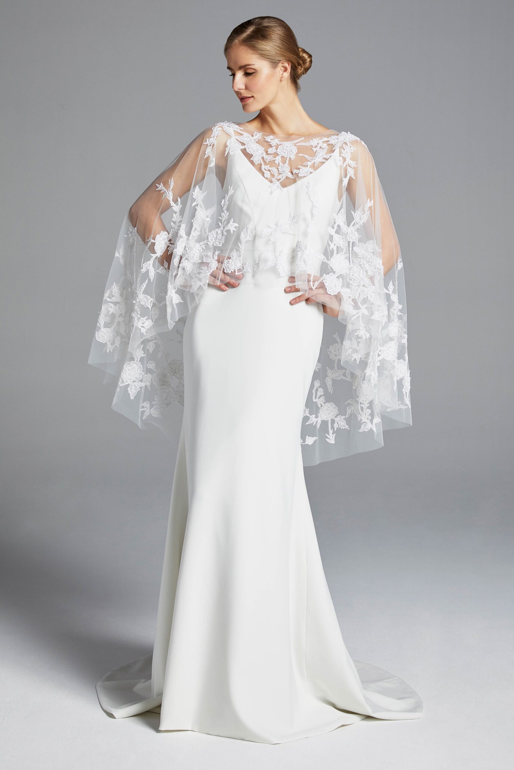 white silk lace gown with cape