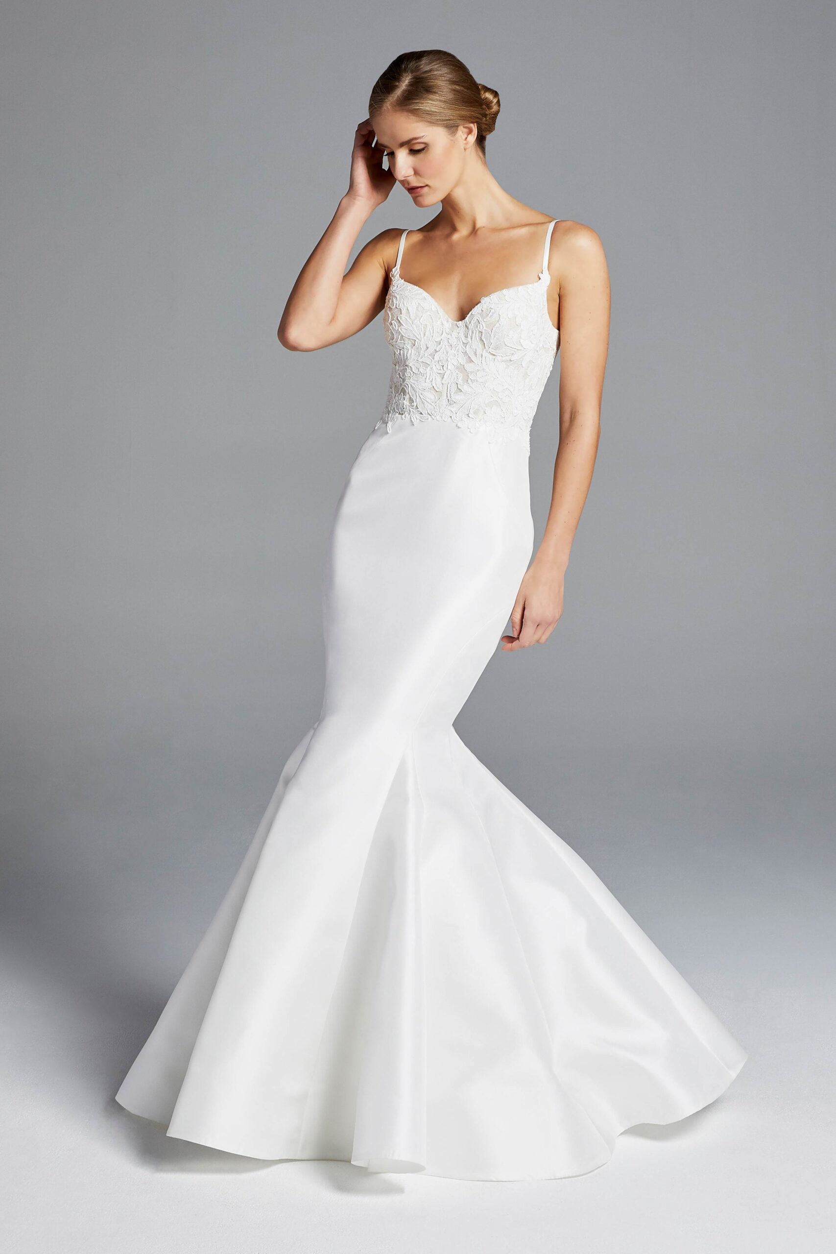white fitted sleeveless gown
