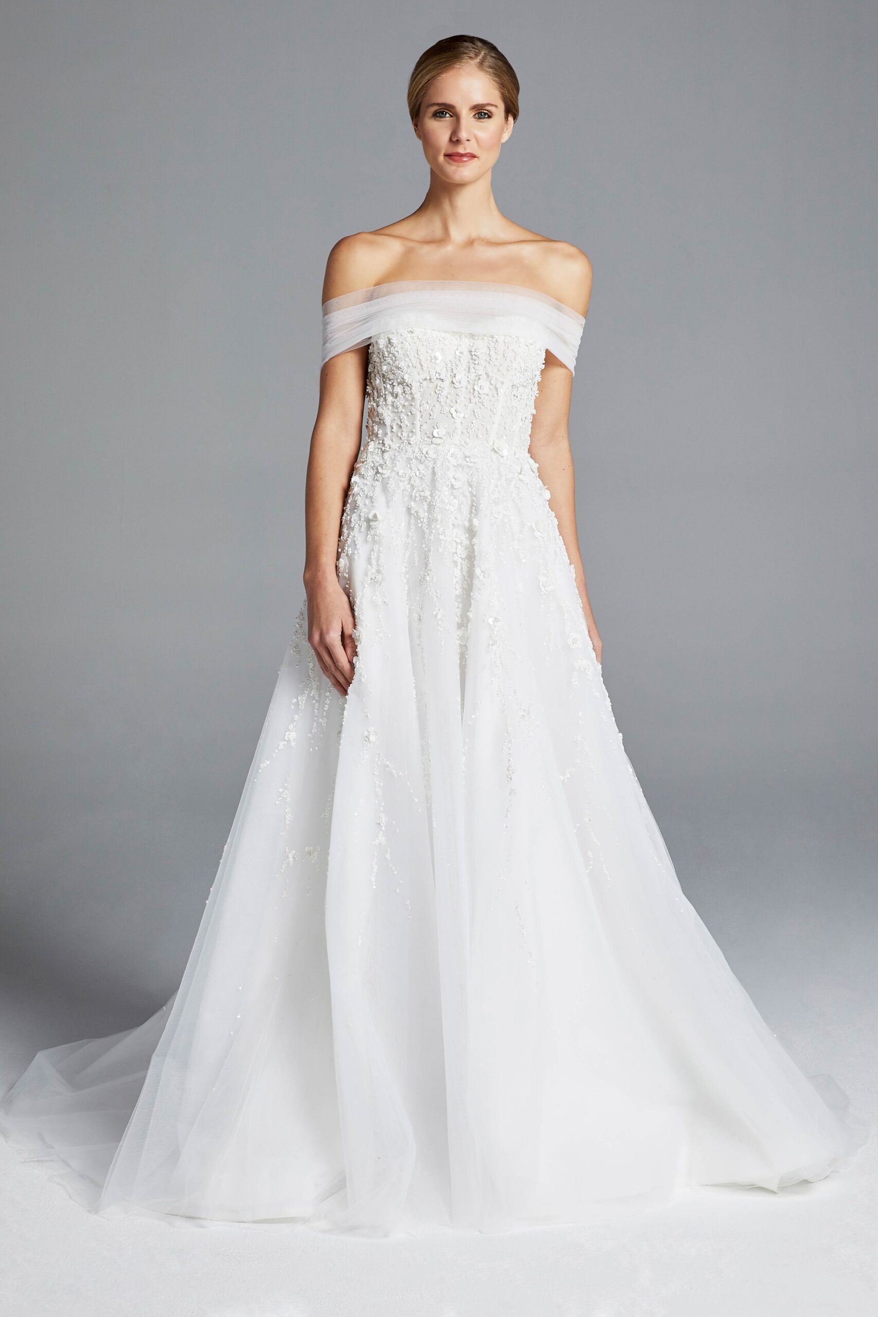 white off-shoulder embroidered gown