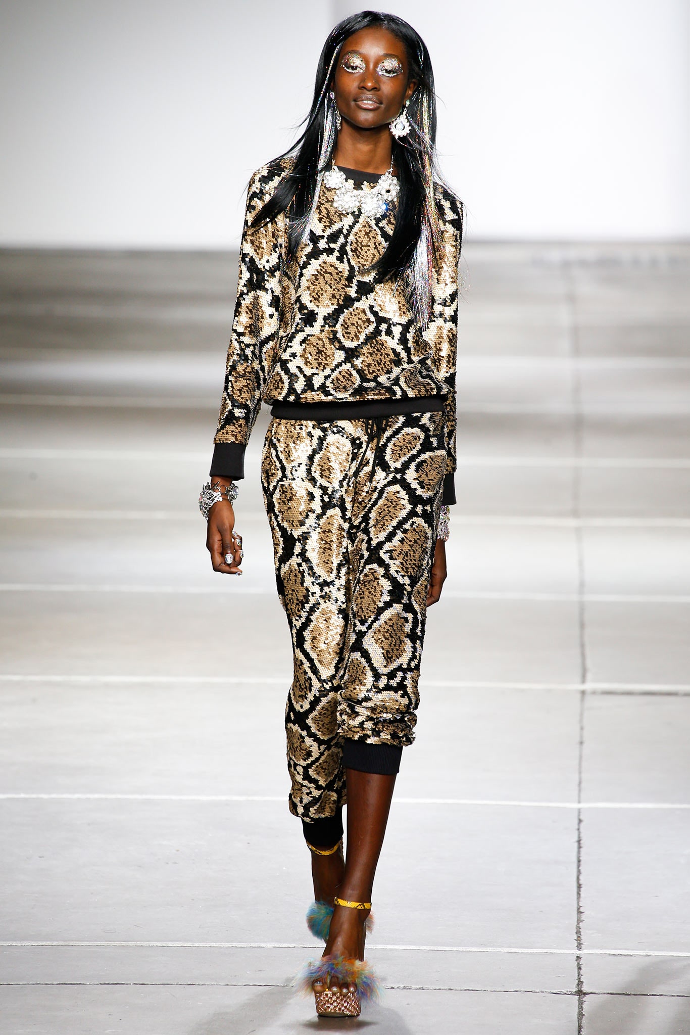 gold and black printed top and pants