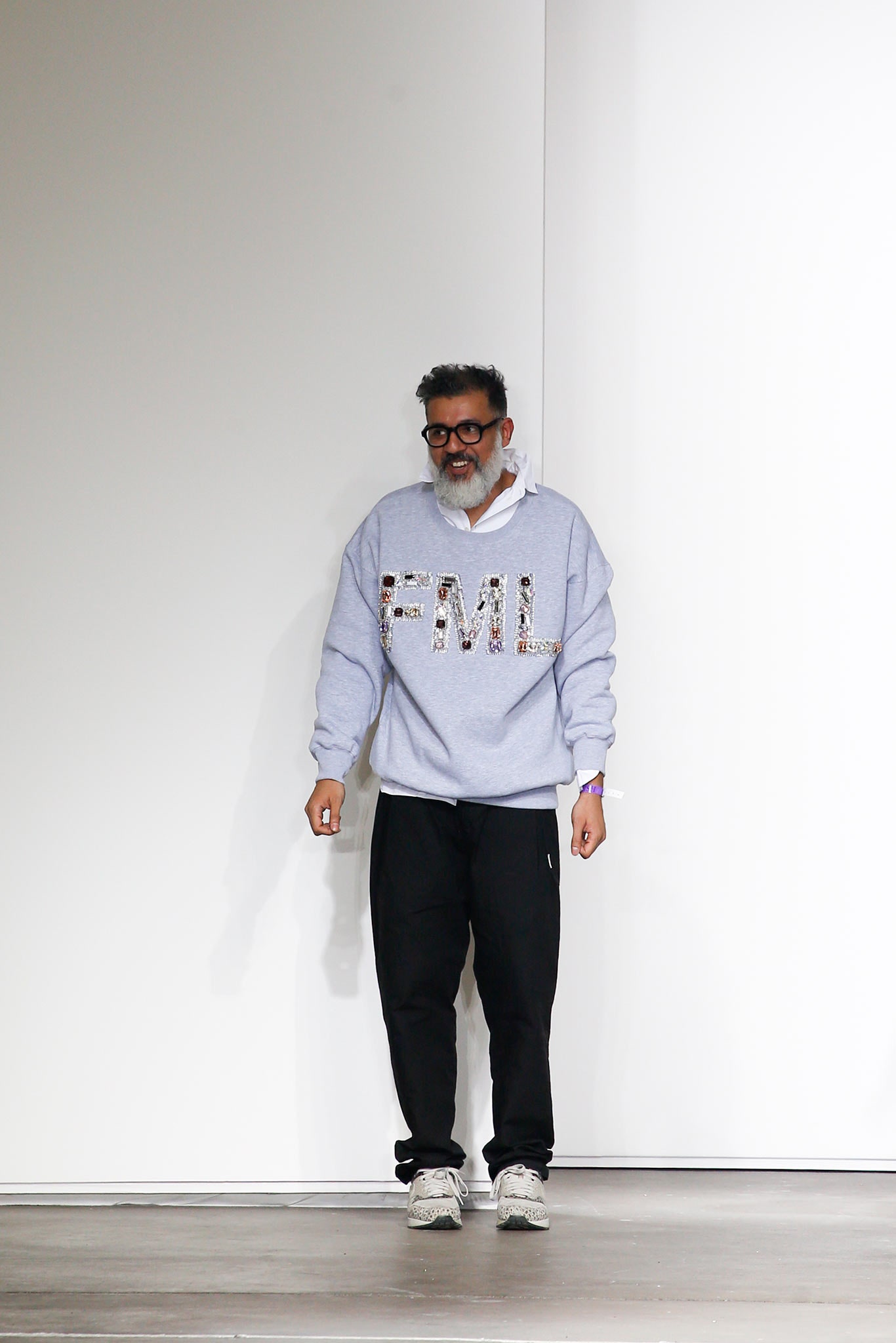 gray hoodie and black pants