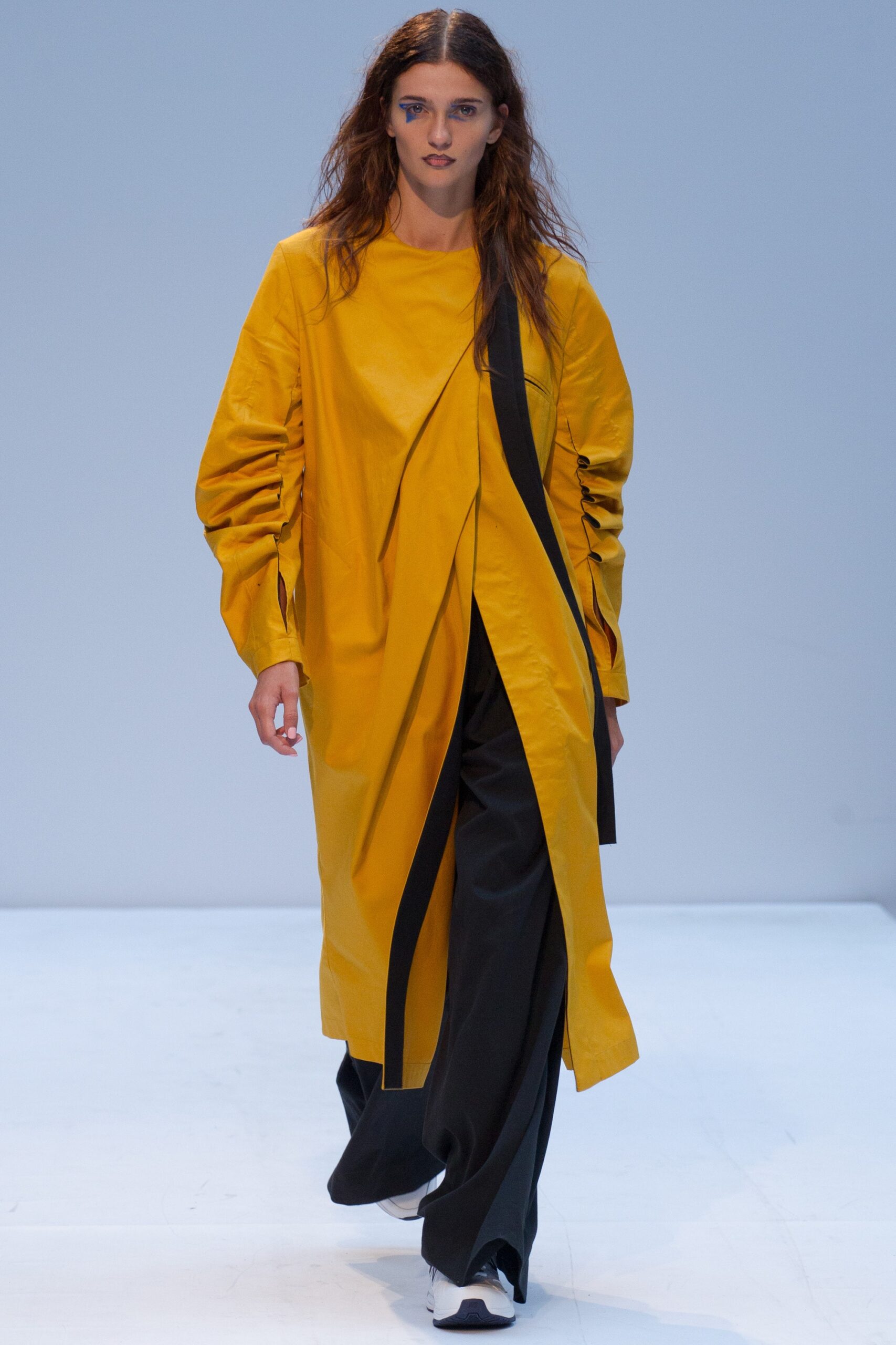 yellow draped midi dress with black pants